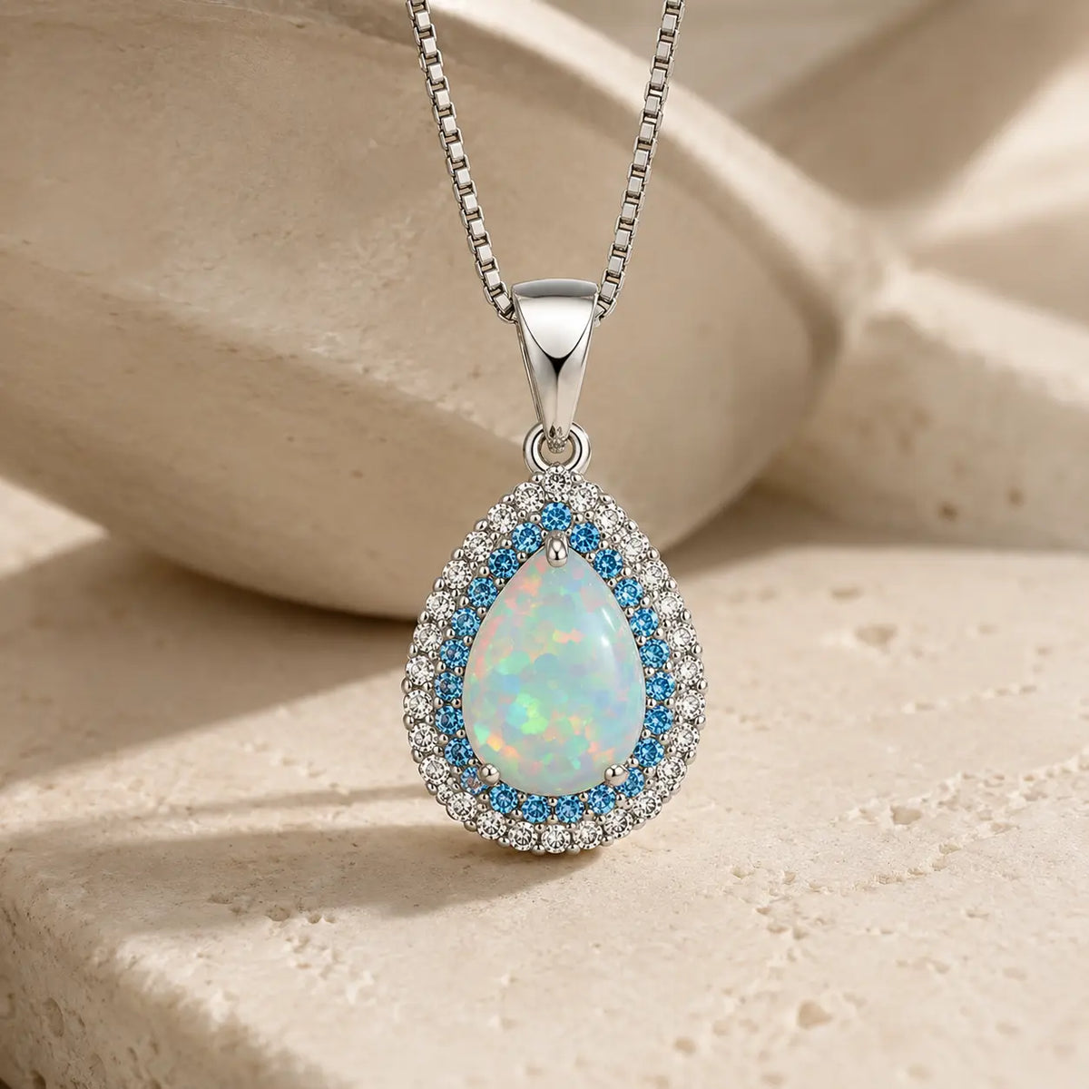 Trudy - Pale Blue Teardrop Halo Necklace