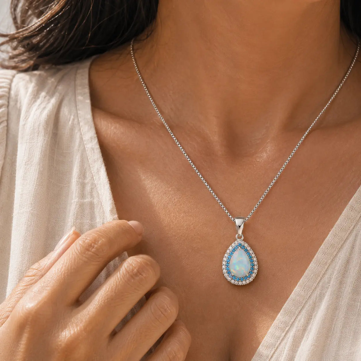 Trudy - Pale Blue Teardrop Halo Necklace