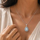 Trudy - Pale Blue Teardrop Halo Necklace