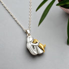 Arlene - Dog Embrace Pendant Necklace