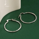 Wendy - Sleek Silver Hoop Earrings